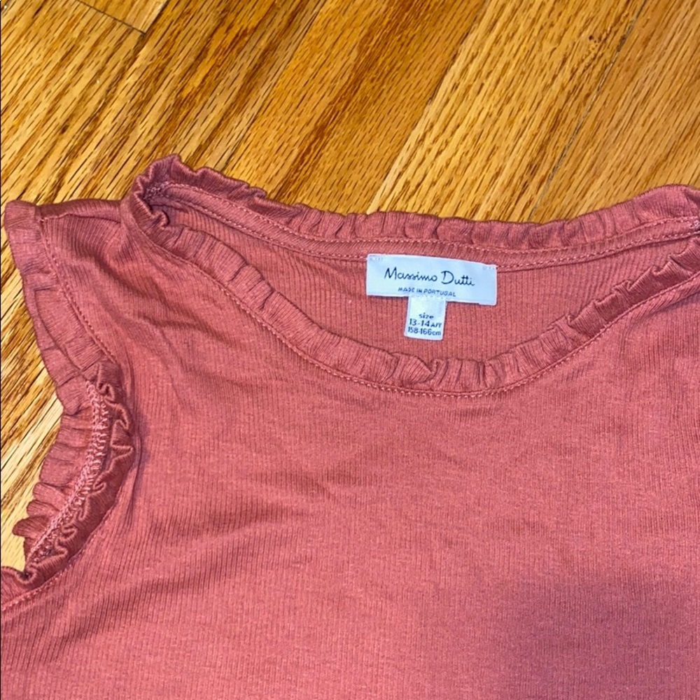 Coral Pink Tank atop